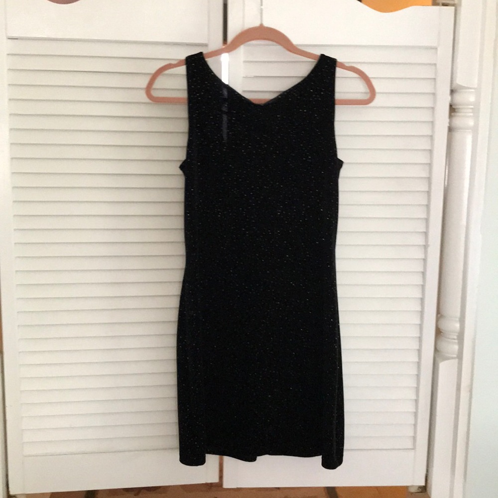 Little black dress with specs of silver.